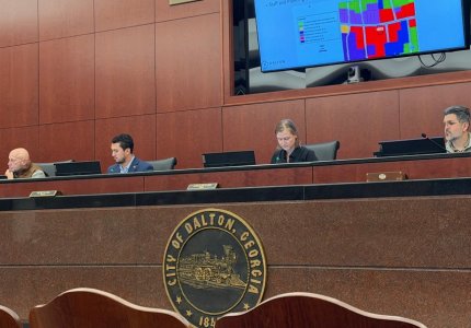 Mayor Sams and members of the City Council listen during a presentation Monday night 