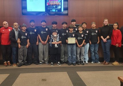 Members of the North Georgia Soccer Academy's National Champs posed with the Dalton Mayor and Council Monday night
