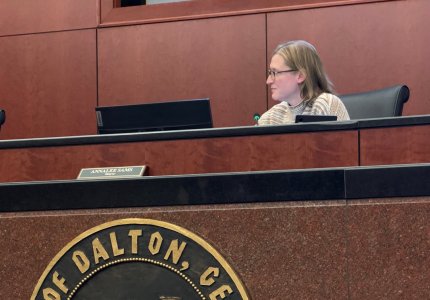 Mayor Annalee Sams listens to a speaker during Monday night's meeting 