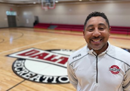 Michael Robinson stands in one of the basketball gyms at the Mack Gaston Community Center where he is the new facility director