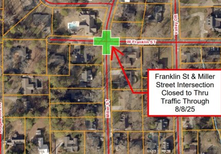 The affected intersection is highlighted in green on a satellite map 