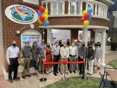 city leaders cut the ribbon at the JA Discovery Center
