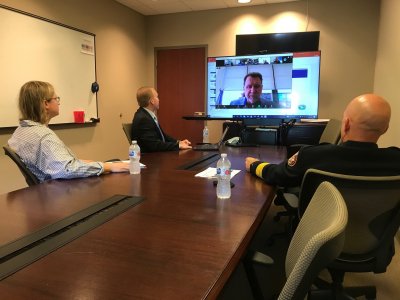 Councilmember Annalee Harlan, City Administrator Andrew Parker, and Fire Chief Todd Pangle take part in a video meeting