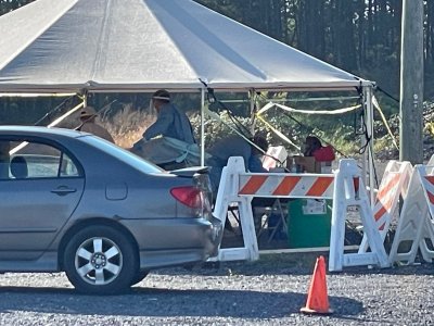 A tent shields workers at a recent Regeneron treatment clinic from the sun