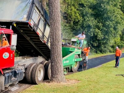 Paving crews work at the Nob North Golf Course