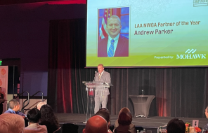 Andrew Parker gives an acceptance speech after receiving the LAA's Northwest Georgia Partner of the Year Award Thursday