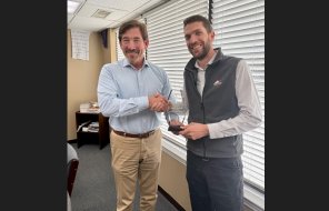 Andrew Wiersma (right) receives the James Stogner Award from Dalton Airport Authority Chairman Danny Morgan (left) 