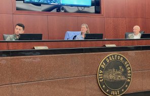 (from left to right) Councilmember Nicky Lama, Mayor Annalee Sams, and Councilmember Steve Farrow listen during a presentation a