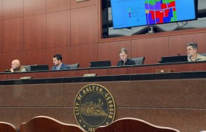 Mayor Sams and members of the City Council listen during a presentation Monday night 