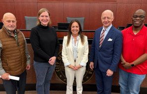 New City Councilmember Julie Locke (center) poses with the Mayor and Council 