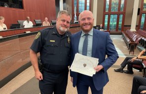 Chief Cliff Cason honored Detective Ben Ridley (right) as the DPD's Officer of the Month for April 