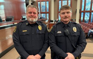 Patrick Lee (right) poses with Chief Cliff Cason after being presented for promotion at Tuesday morning's meeting of the Public 