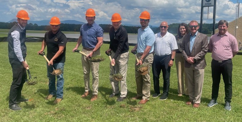 Members of the Dalton Airport Authority joined City staff at a groundbreaking ceremony Tuesday for one of three new hangars whic