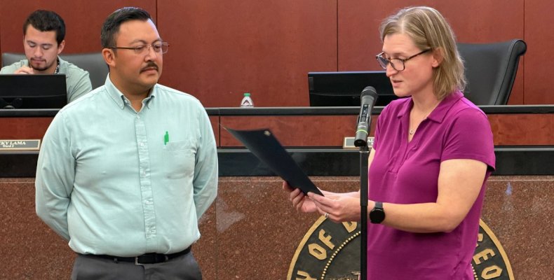 Mayor Annalee Sams reads a proclamation for Cybersecurity Awareness Month as City of Dalton IT Director Jorge Paez looks on