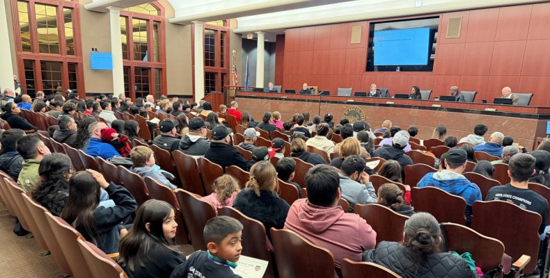 A large crowd packed Tuesday night's meeting of the Mayor and Council to cheer on four state championship teams from the DPRD