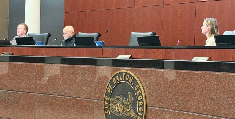 Members of the City Council listen during a presentation 