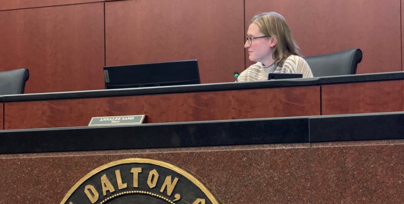 Mayor Annalee Sams listens to a speaker during Monday night's meeting 
